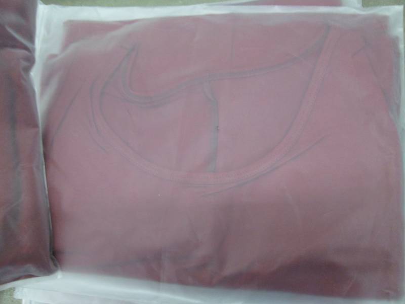 lot 23 image: 6 Small Sleeveless Tunic Tshirt Dre...