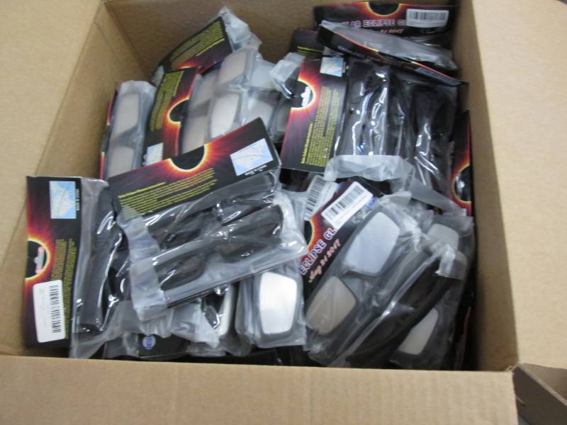 lot 24 image: Large Box Of Solar Eclipse Glasses...