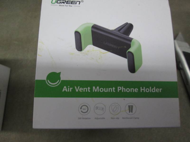 lot 56 image: Lot of 4 Hands Free Air Vent MountP...