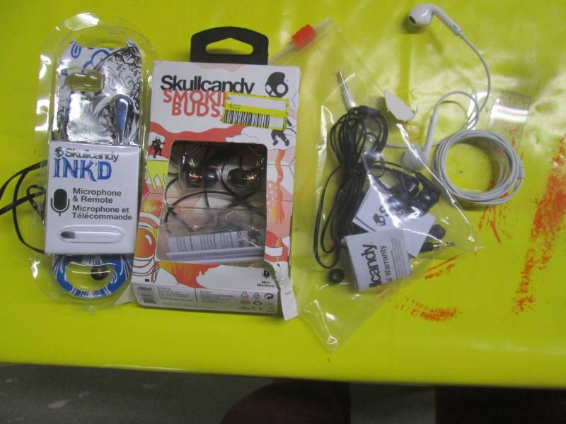 lot 180 image: lot of wired skull candy headphones...