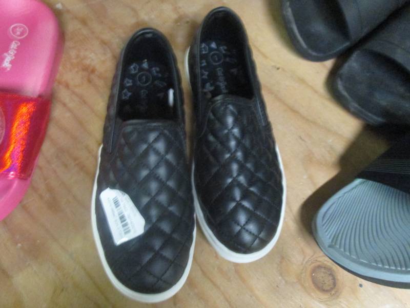 lot 281 image: size 1 black sneakers...