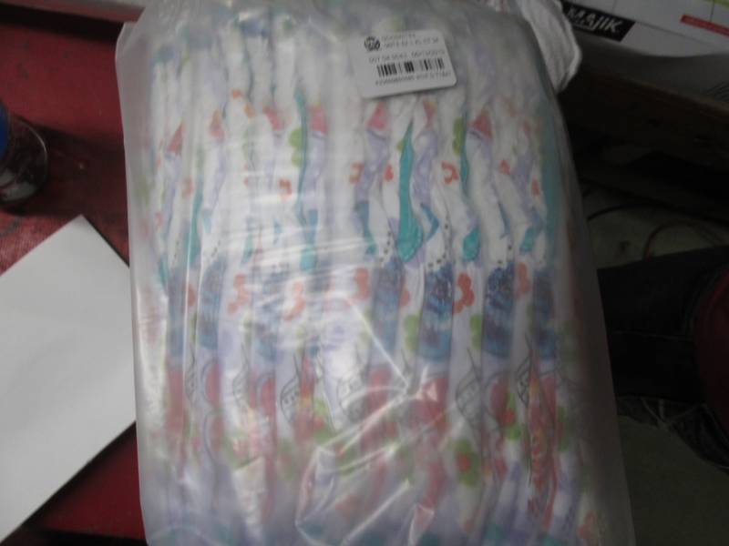lot 19 image: Goodnites size XL 34 CT...
