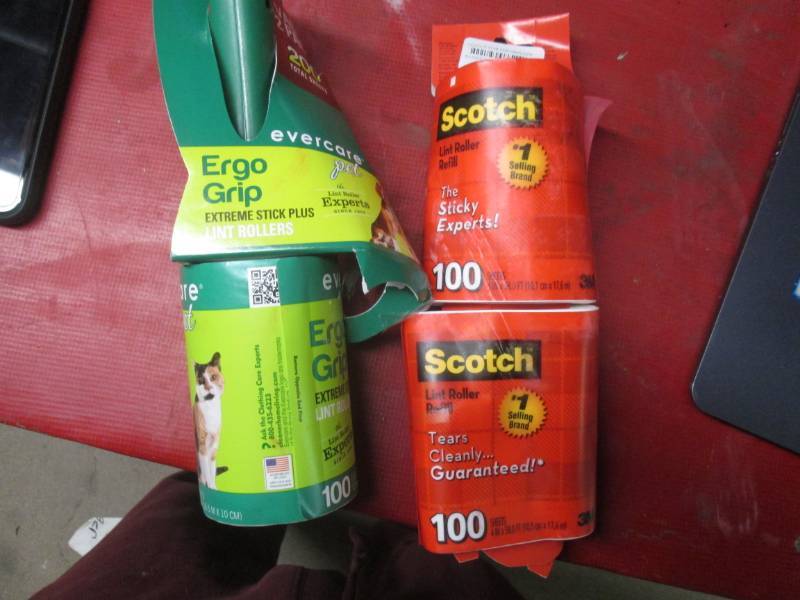 lot 44 image: lint roller and refills...