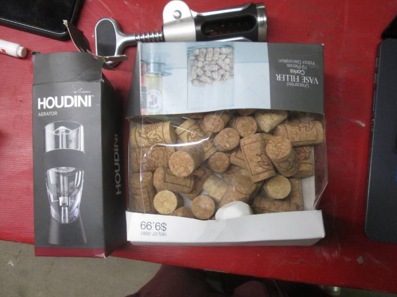 lot 52 image: Houdini aerator, vase fillers, and ...