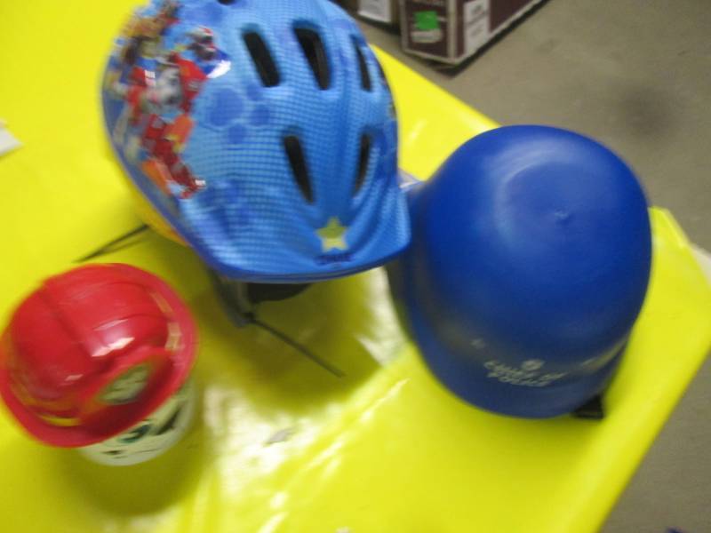 lot 125 image: lot of kids helmet and misc toy ite...