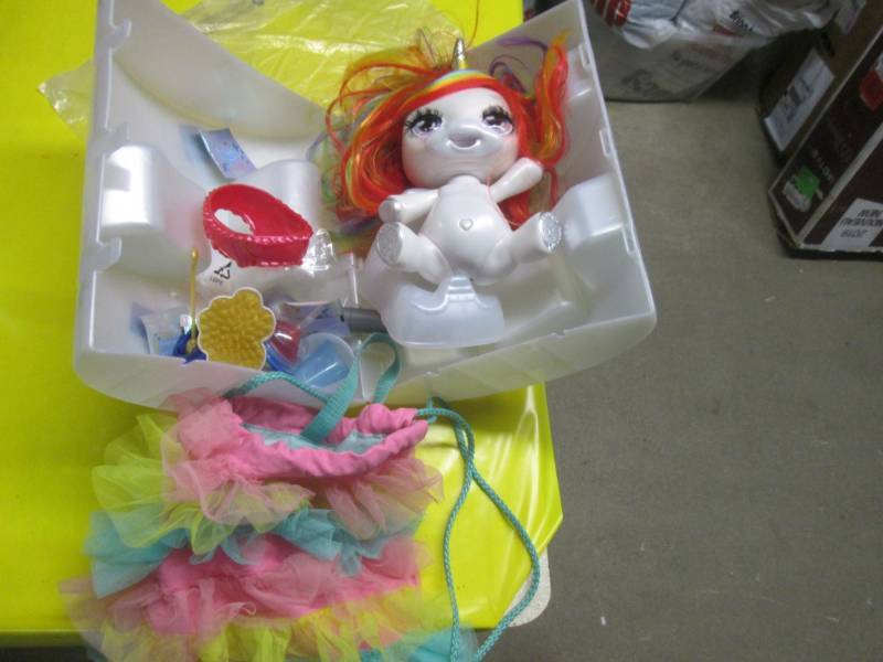 lot 135 image: unicorn poopsie toy...
