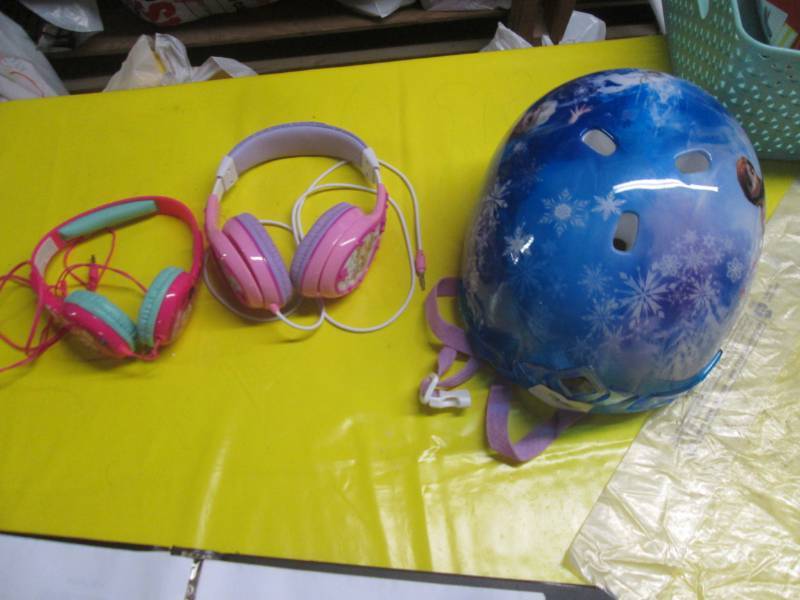 lot 142 image: girls kids helmet and pair of headp...