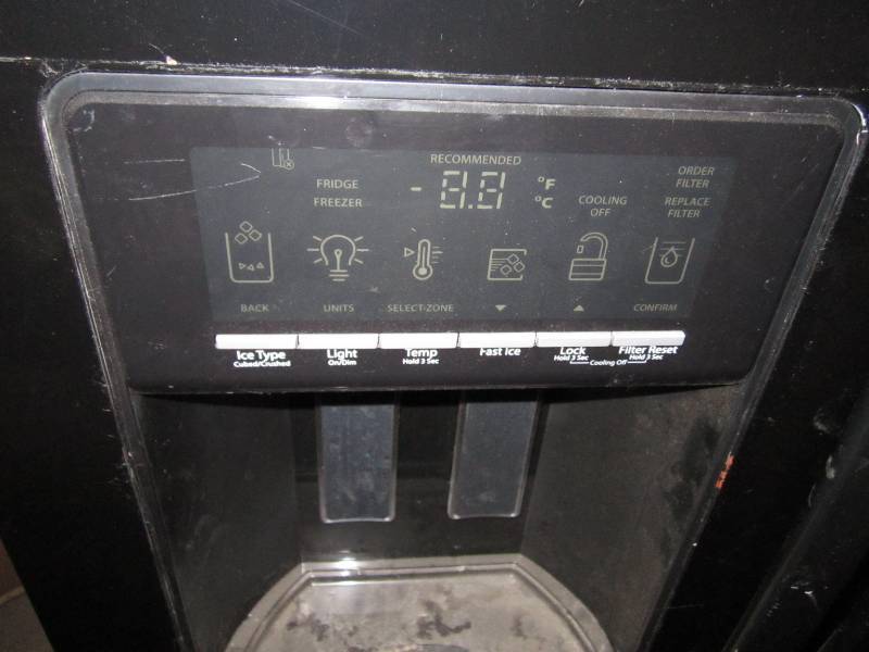 Whirlpool side by side refrigerator...