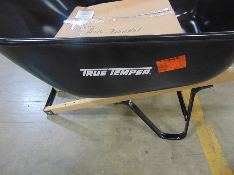 lot 249 image: True Temper 6 cu. ft. Steel Wheelbarrow S6BUT25