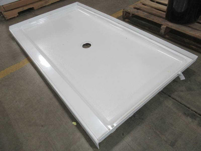 lot 64 image: Sterling Guard Plus White Vikrell Shower Base 34-in W X 60-in L with Center Drain 72331800-0. - Small Crack in back