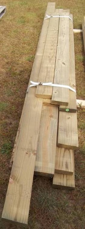 lot 19 image: Green Treated 2X6s