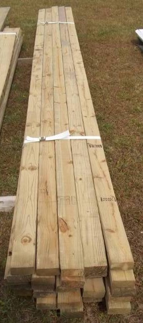 lot 21 image: Green Treated 2X4s