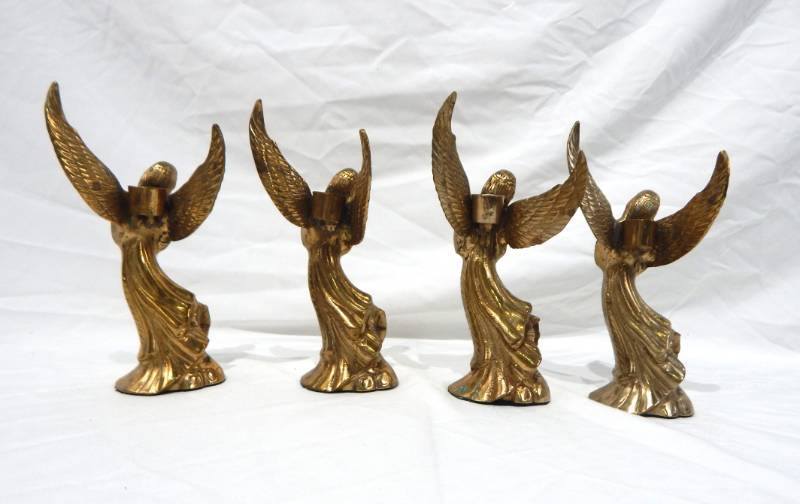 lot 63 image: Set of Four Vintage Marshall Fields Brass Angel Candle Holders