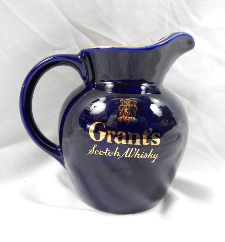 lot 77 image: Vintage Grants Scotch Whiskey Cobalt Blue Ceramic Pitcher