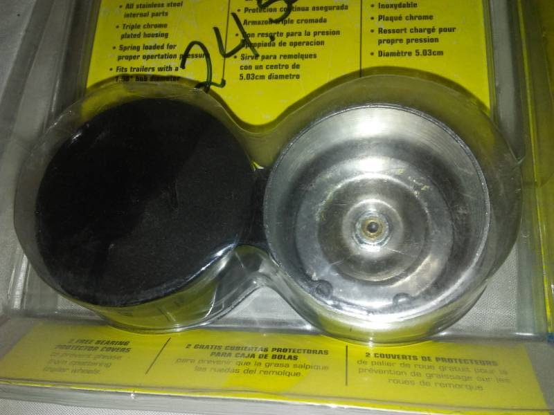 lot 210 image: Wheel bearing protectors and 2 wheel bearing sets - new.