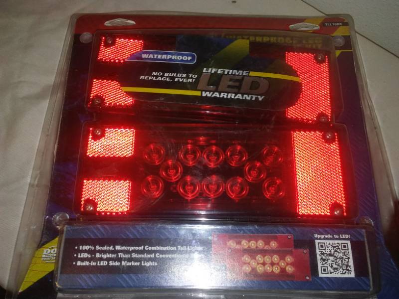 lot 211 image: New waterproof trailer LED taillights by optronics.