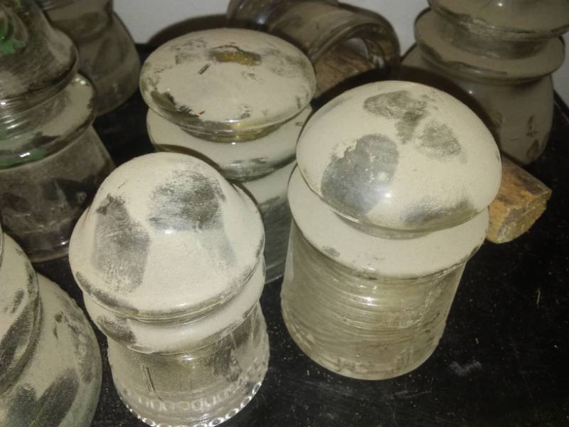 lot 268 image: Porcelain and glass insulators.
