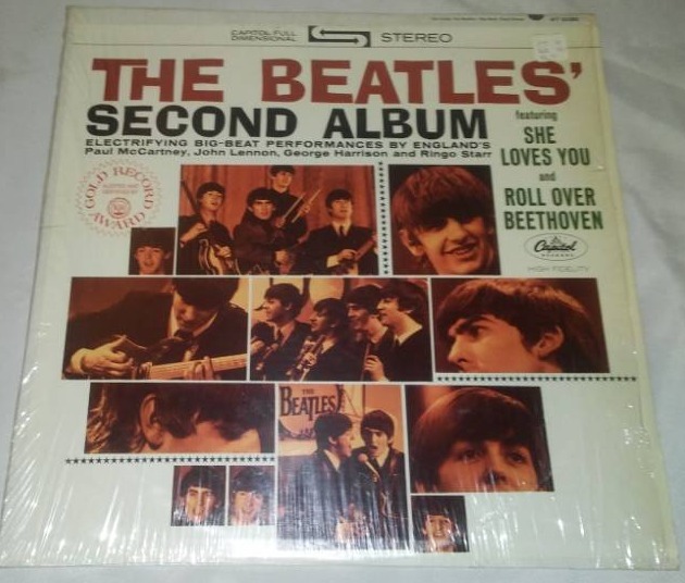 lot 292 image: The Beatles second album with cellophane and price tag near mint condition.