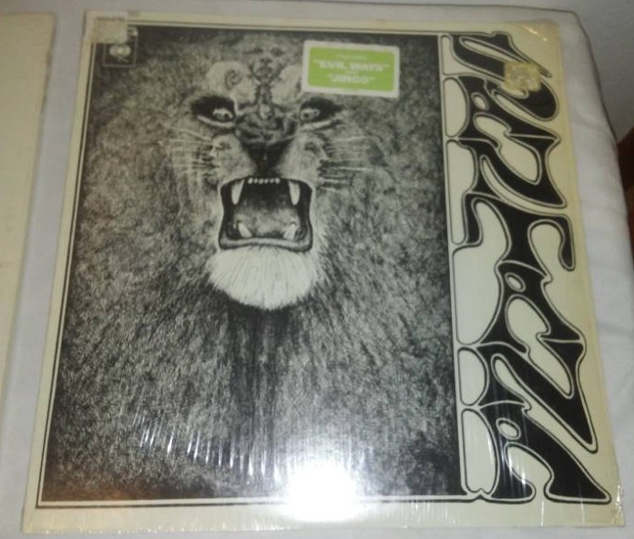 lot 294 image: 2 near mint Carlos Santana.