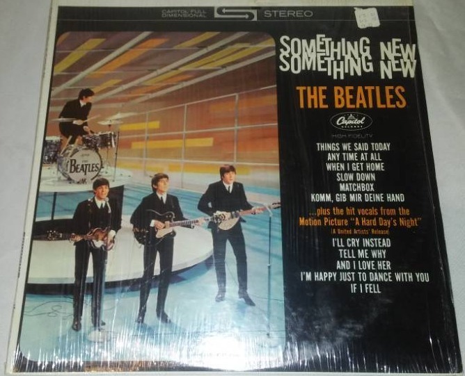lot 299 image: The Beatles something new album in cellophane and price tag with cellophane and price tag near mint.
