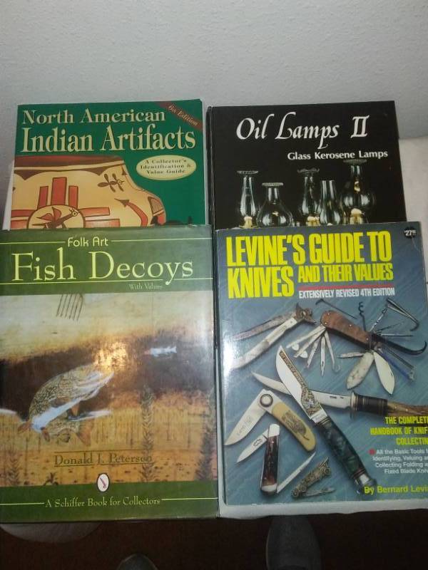 lot 321 image: Collectors guidebooks - fish decoys, oil lamps knives and Indian artifacts.