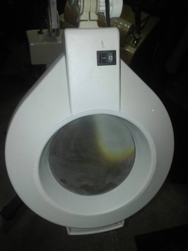 lot 31 image: Magnification light for nails on rolling floor stand.
