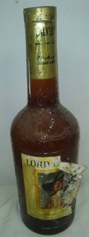 lot 7 image: Lord Calvert huge glass bottle
