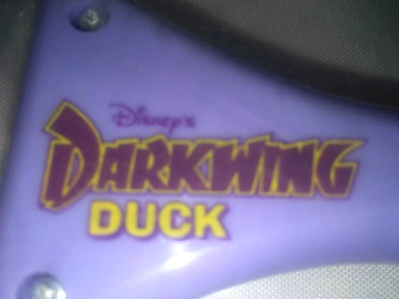 lot 48 image: Dark wing duck magnifying spyglass.