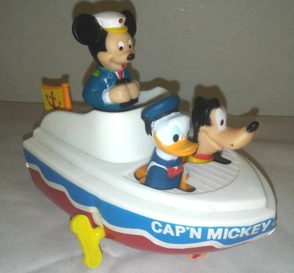 lot 185 image: Capn Mickey Wind - up boat - works perfectly