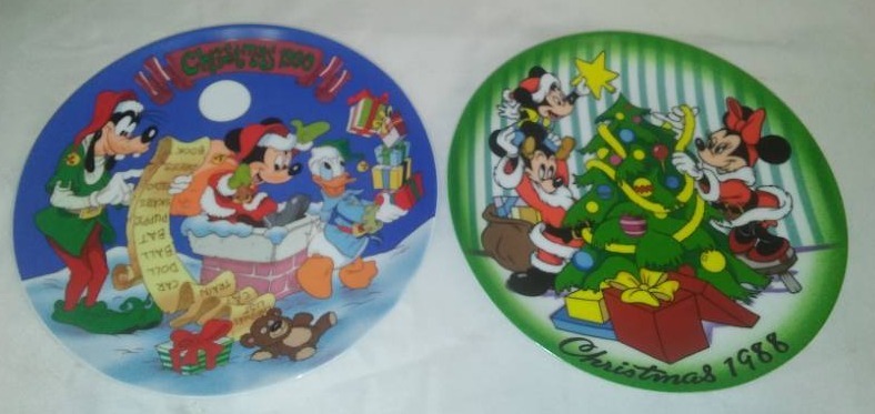 lot 203 image: Disney Christmas Plates 1998, 2000.