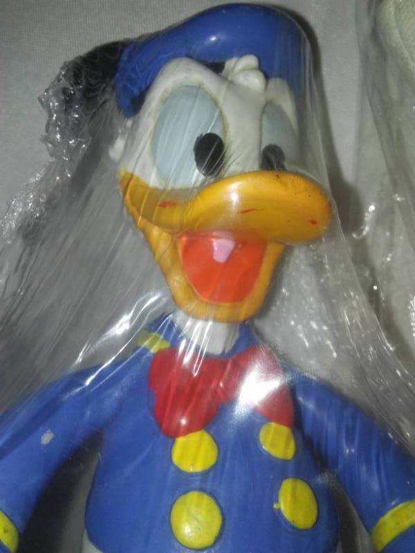 lot 216 image: Disney factory wrapped Duck figures Mickey Minnie Donald Duck.