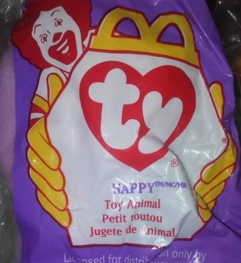 lot 222 image: Mountain of Happy Meal Toys  more.