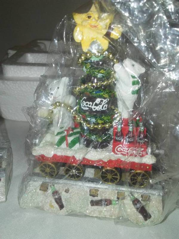 lot 253 image: Coca - Cola Christmas Polar Bear Express Train - Set 1 with COA