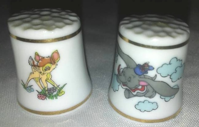 lot 299 image: Disney Sewing Thimbles (5),