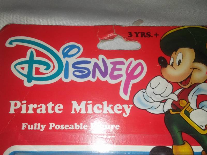 lot 53 image: Disney  poseable figure and action marbles, new in container.