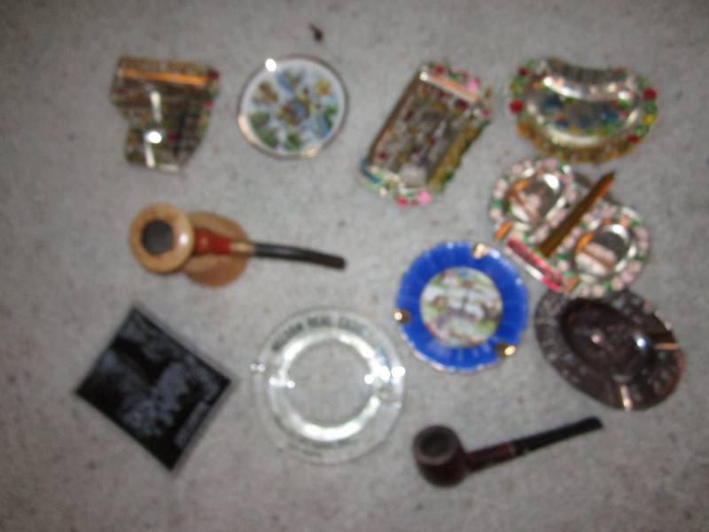 lot 14 image: Vintage pipes and ash trays...