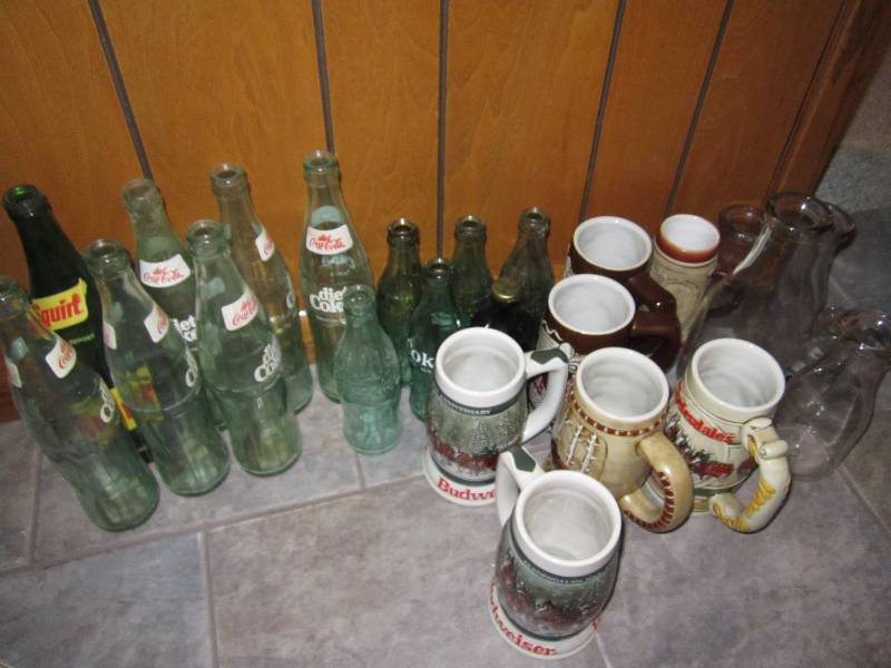 lot 51 image: Old bottles, beer steins, milk bott...