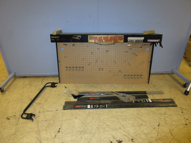lot 605 image: WALL MOUNTED PEG BOARD, RUBBERMAID FASTTRACKS AND STORAGE BARS