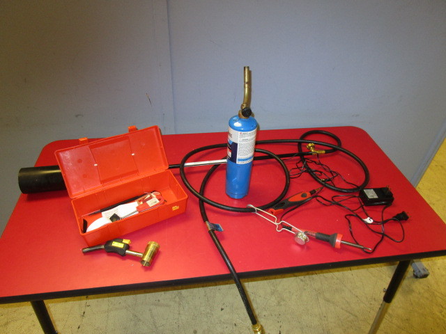 lot 627 image: MAGNA TORCH NOZZLE, WELLER SOLDERING GUNS, AND HAND TORCH