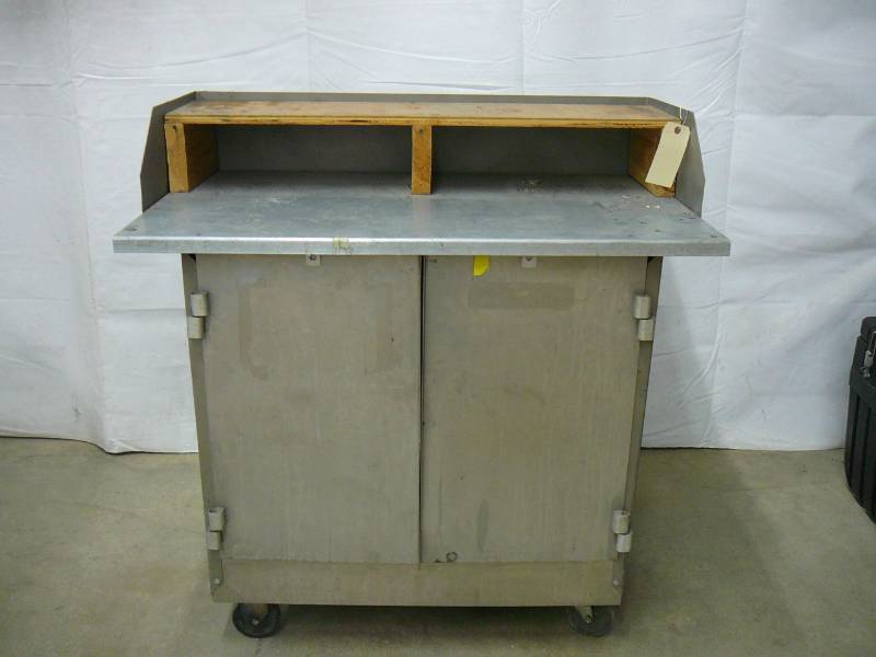 lot 1 image: Steel 2 Door Work Bench On Casters