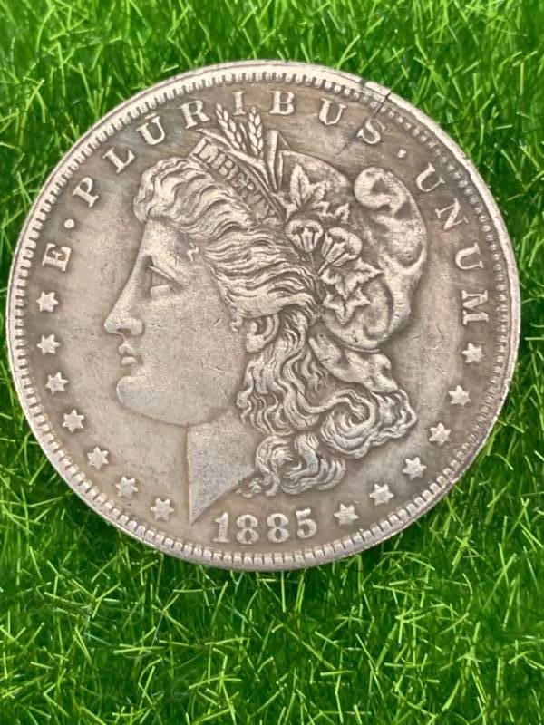 lot 56 image: 1885 Morgan Dollar Zombie Coin