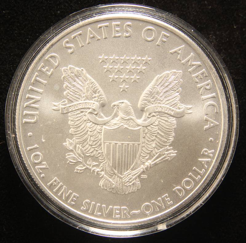 lot 17 image: 2009 AMERICAN SILVER EAGLE 1 TROY OZ. .999 FINE SILVER IN AIRTITE
