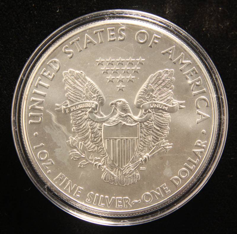lot 40 image: 2012 AMERICAN SILVER EAGLE 1 TROY OZ. .999 FINE SILVER IN AIRTITE
