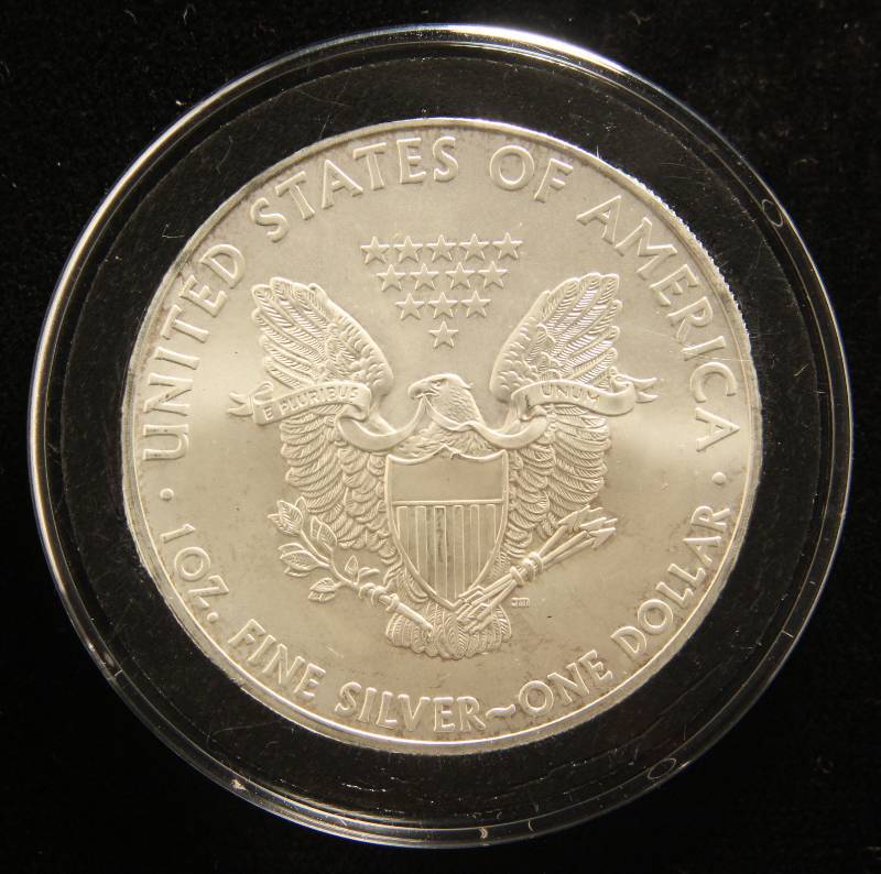 lot 41 image: 2013 AMERICAN SILVER EAGLE 1 TROY OZ. .999 FINE SILVER IN AIRTITE