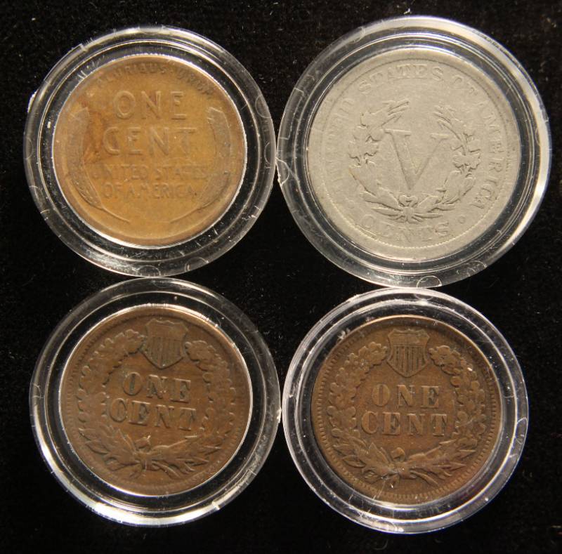 lot 42 image: 4 US COINS IN AIRTITES AS PICTURED