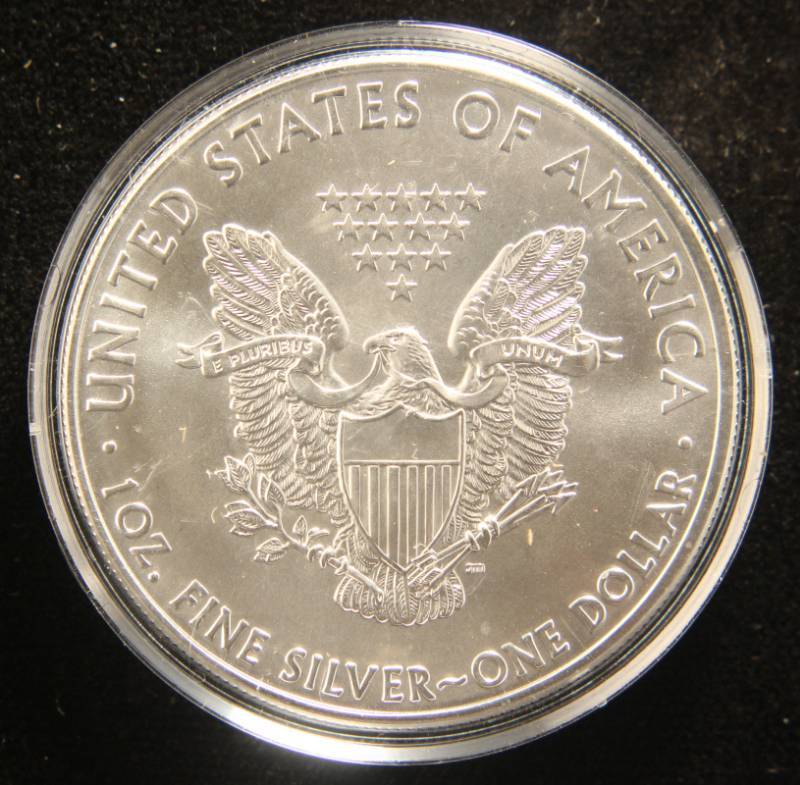 lot 45 image: 2014 AMERICAN SILVER EAGLE 1 TROY OZ. .999 FINE SILVER IN AIRTITE