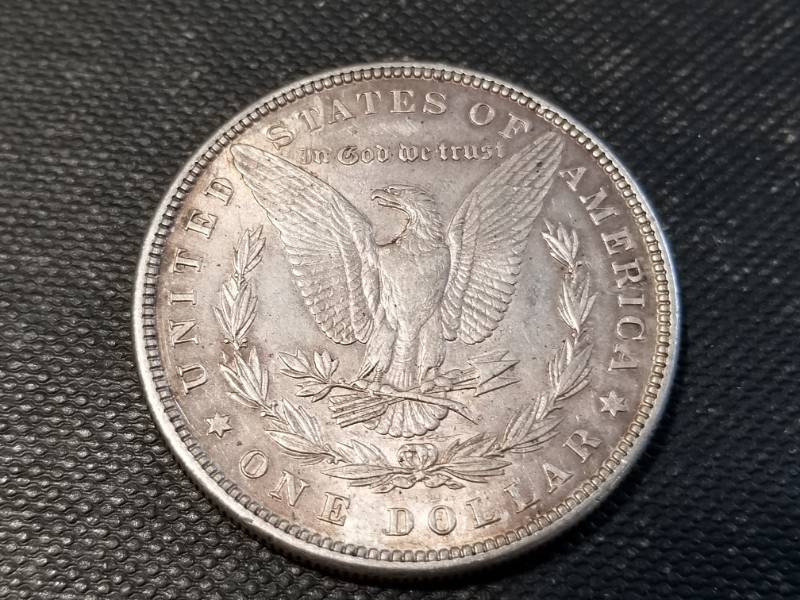 lot 06-A image: 1885 MORGAN SILVER DOLLAR