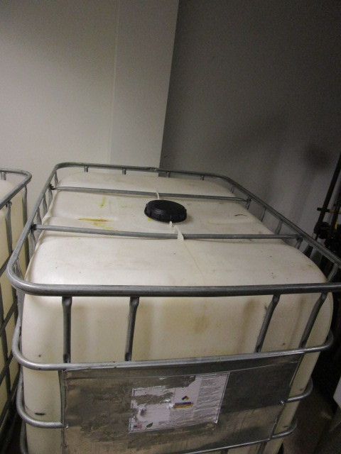 lot 755 image: SCHUTZ STORAGE TANK WITH METAL FRAME
