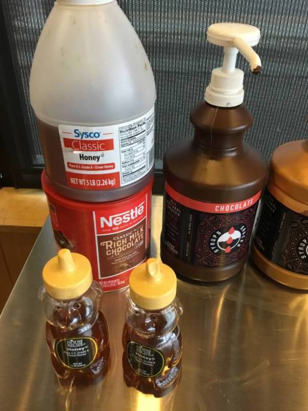 Lot of syrups, honey and hot chocolate.