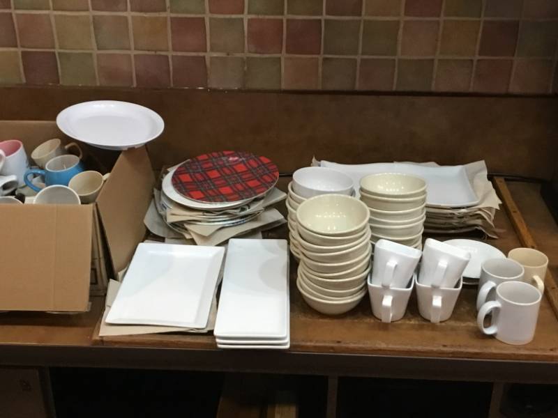 Large collection soup bowls, large amount of coffee cups various sizes, platters, variety of plates.